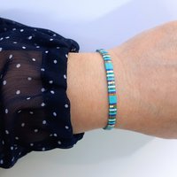 Elegant glass beads bracelet strung on transparent stretch cord in happy summer colours  Two strands with square tile beads in turquoise blue, green, white and gold-plated tila beads  Comfortable for every day but also for your party outfit - wear alone or in combination with other bracelets for a beautiful boho stack  All our jewellery is handmade with care and attention to detail in Amsterdam, The Netherlands. This bracelet is made to order at your size using high-quality Japanese glass tile beads